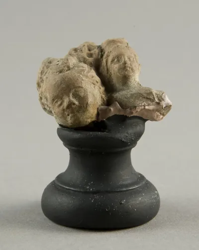 Attached Heads of a Child and a Woman by Ancient Greek, 3rd/1st century BCE