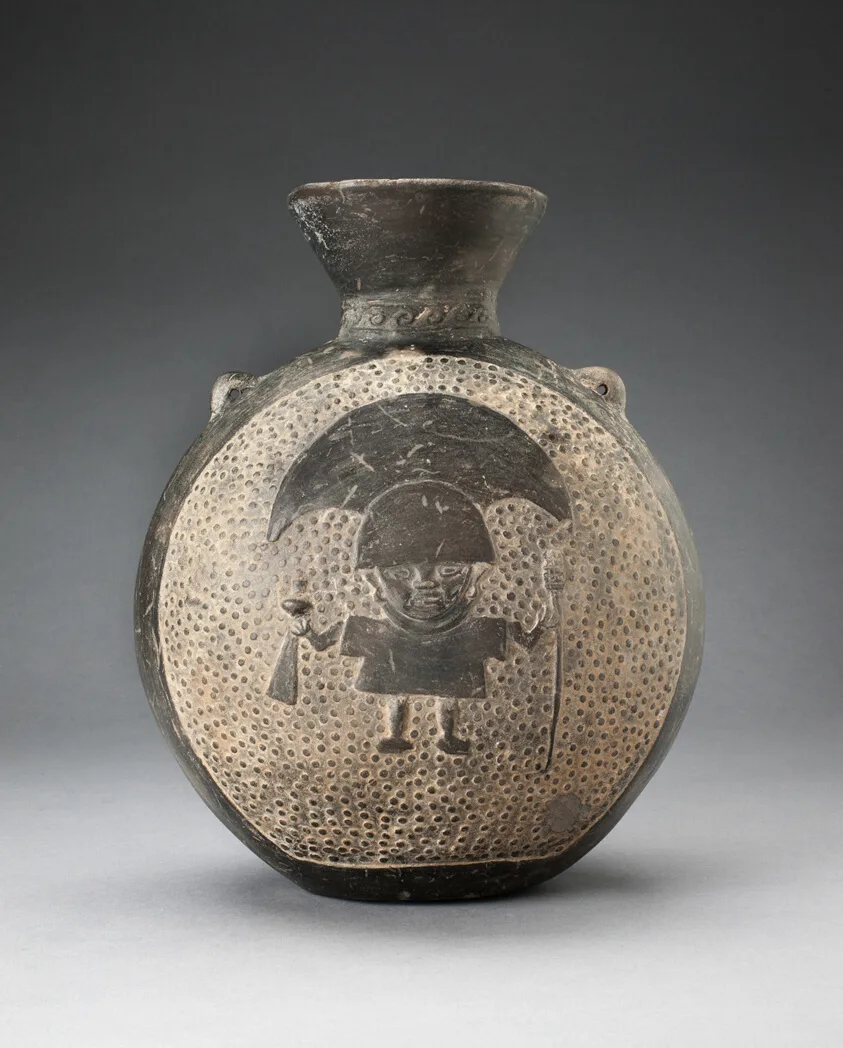 Jar with Relief of Standing Figure with Crescent Headdress, Holding Ritual Objects by Chimú, 1200–1450