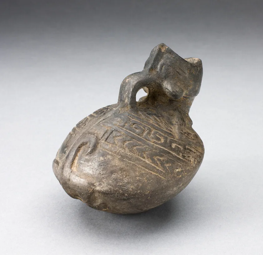 Pitcher in the Form of an Open Mouthed Animal with Geometric Incising on Back by Chimú, 1000–1400