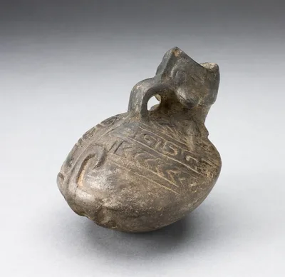 Pitcher in the Form of an Open Mouthed Animal with Geometric Incising on Back by Chimú, 1000–1400