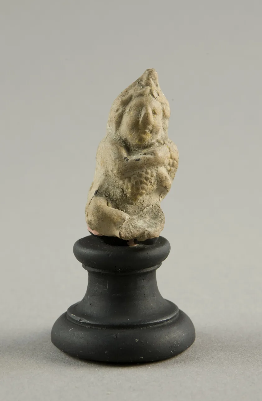 Figurine of a Child Clutching Grapes by Ancient Greek, 2nd-1st century BCE
