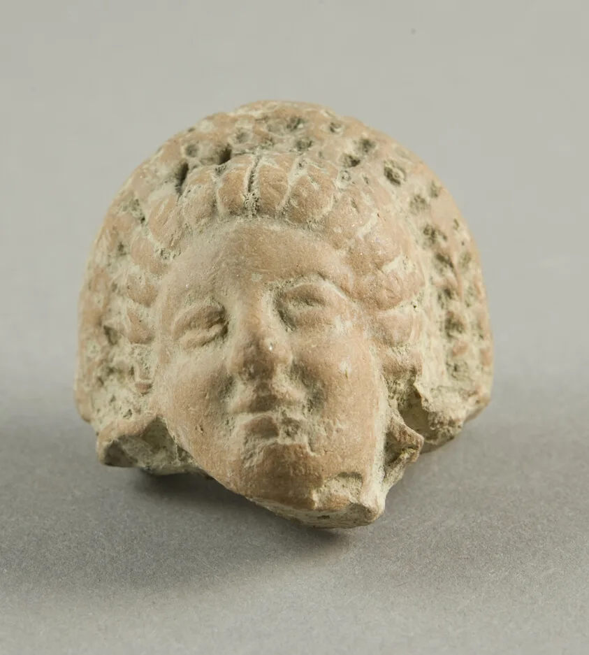 Head of a Woman Wearing Mottled Wreath by Ancient Greek, 3rd-2nd century BCE
