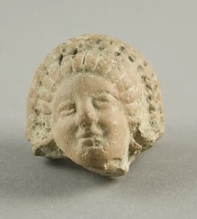 Head of a Woman Wearing Mottled Wreath by Ancient Greek, 3rd-2nd century BCE